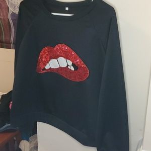 Black sweatshirt with sequined lips